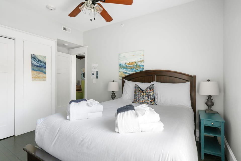 Drift off in style – every bedroom features plush bedding and serene artwork.
