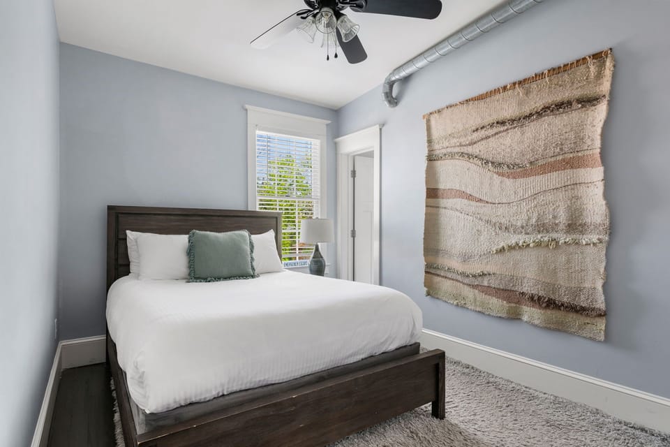 Each bedroom is a peaceful retreat with simple, modern styling.