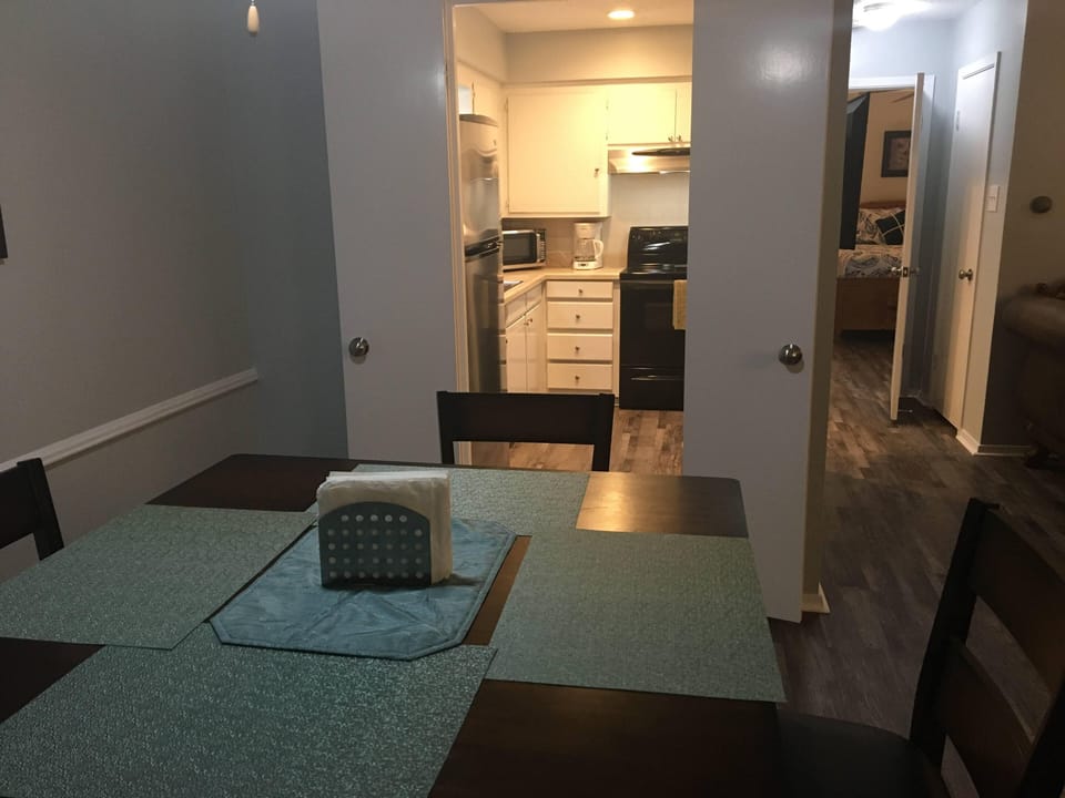 Easy access to kitchen from dining area and living area.