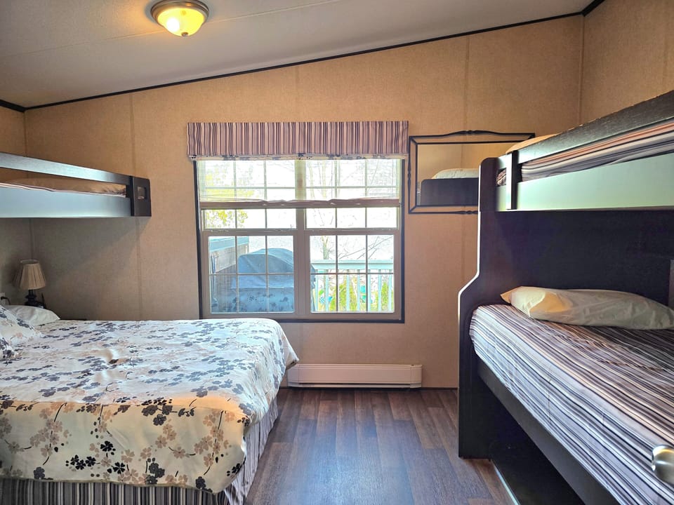 3 Bunk Beds, Stoge under Stirs + B/I Cupboards