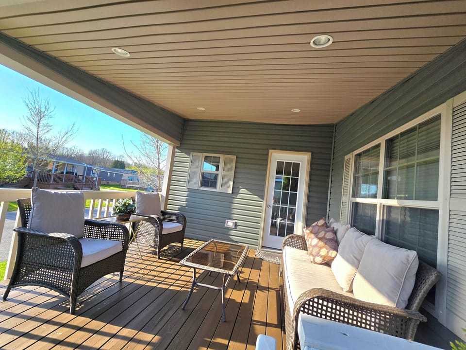 Freshly stained Huge Covered Front Deck!!