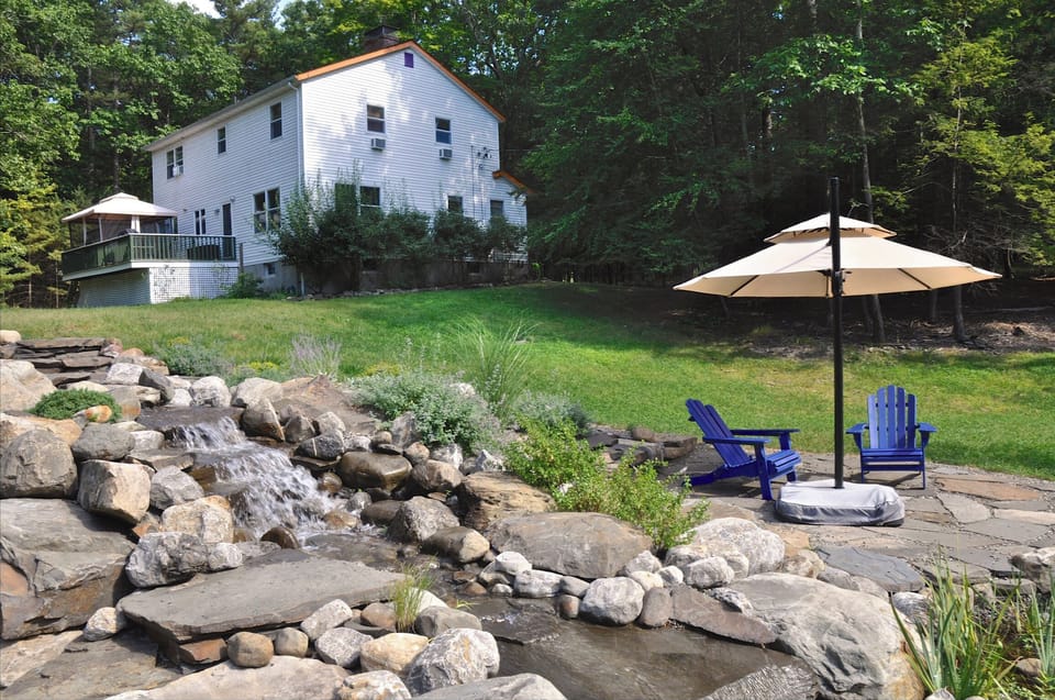 The waterfall at the pond/pool. This helps filter the water.