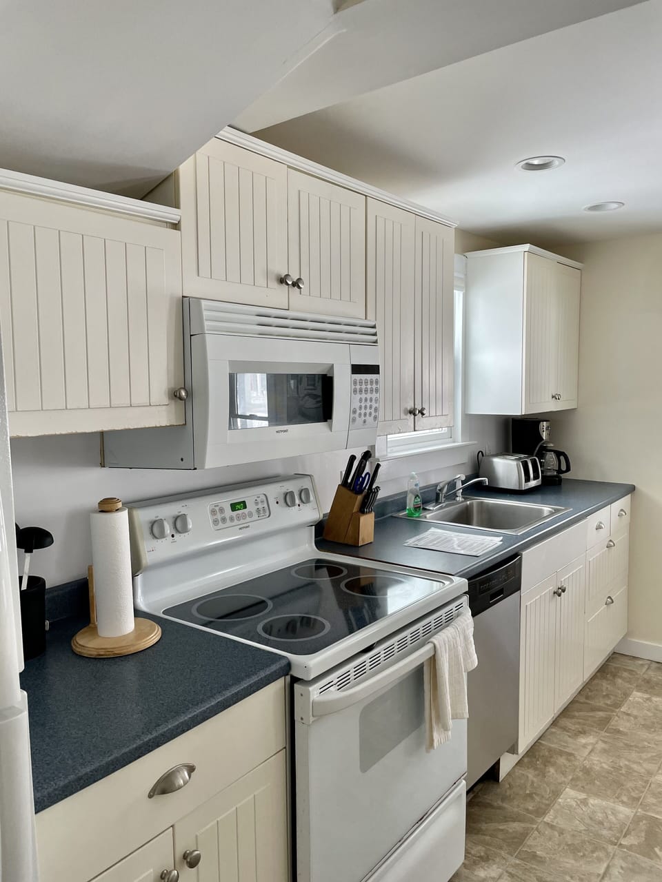 The kitchen is very well equipped with modern appliances and a dishwasher.