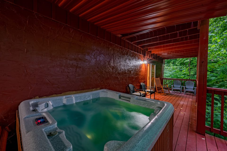Extra seating by the hot tub for those who want to stay dry