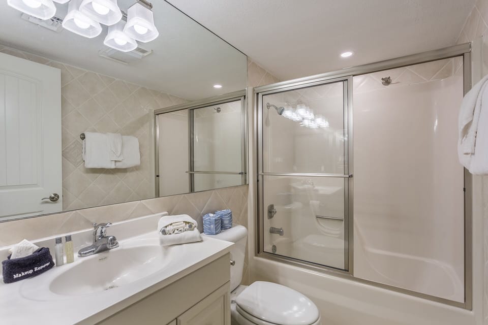 Bright ensuite bathroom with combination tub/shower.