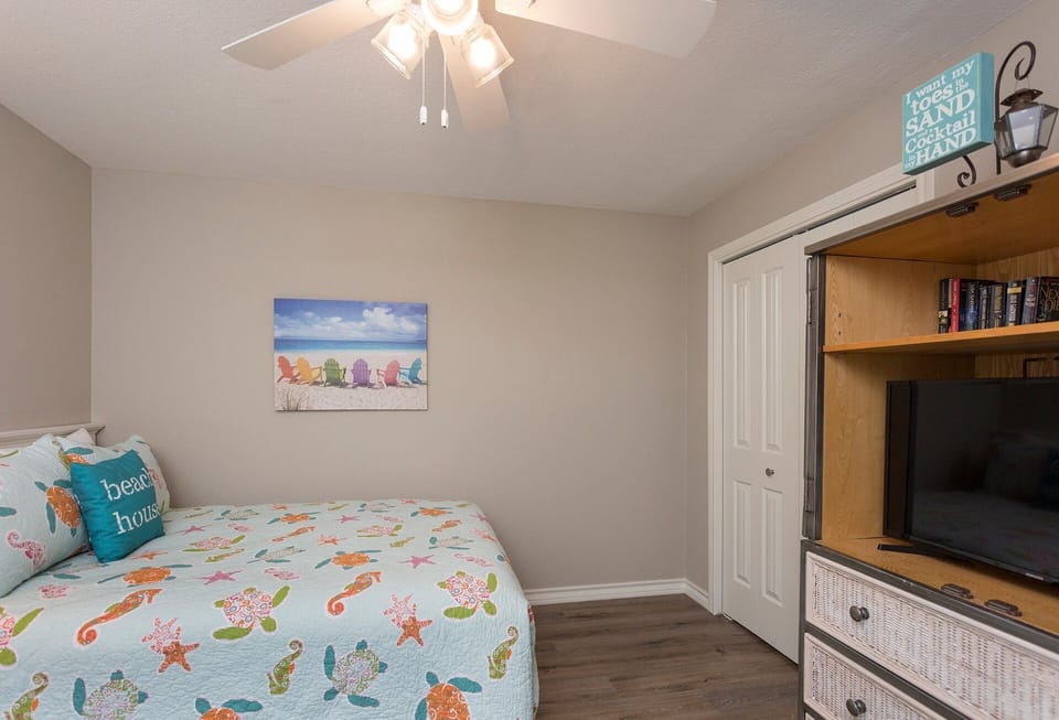 Cozy up around the TV in the guest room and enjoy your favorite movies after a long day on the beach.
