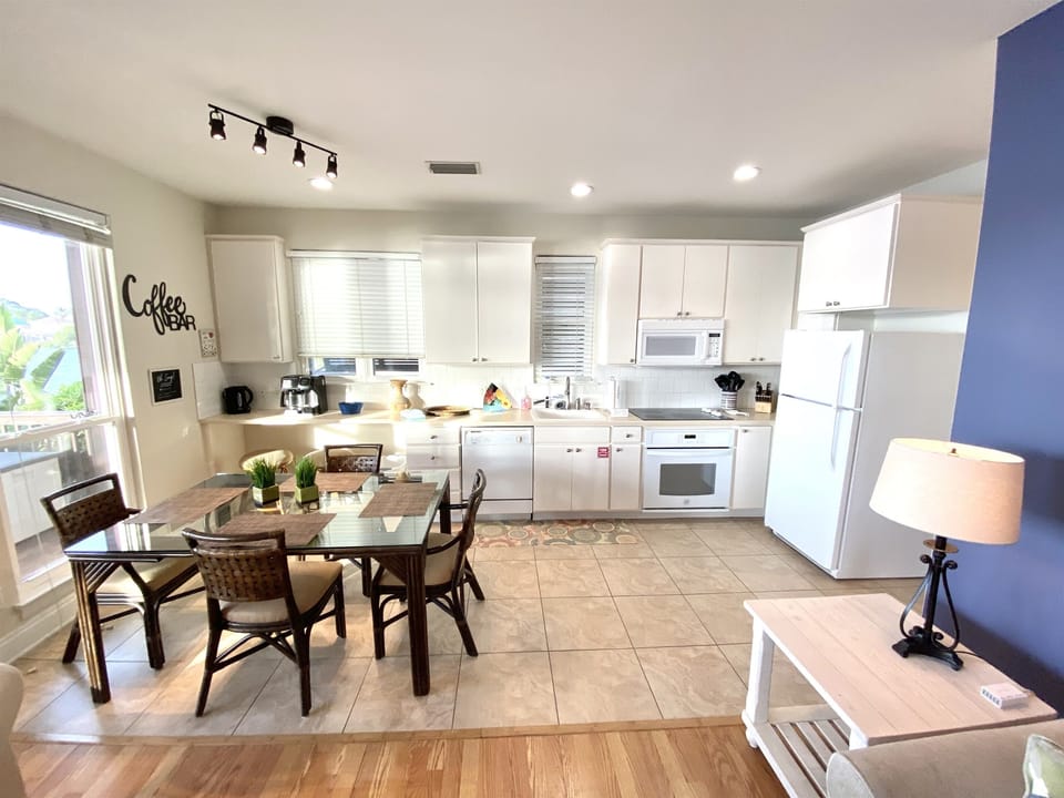1st floor kitchen is well-stocked and has plenty of space for storing food and preparing meals