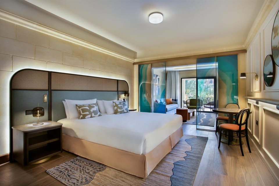 Junior Suite, Pool View | 1 bedroom, hypo-allergenic bedding, minibar, in-room safe
