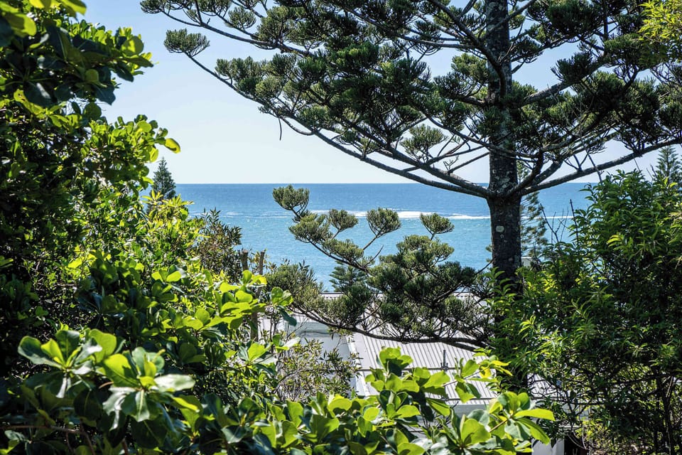 The apartment offers partial views over Moffat Beach.