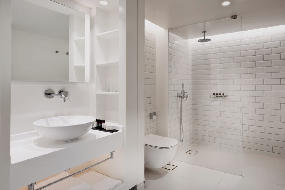 Shower, hair dryer, slippers, towels