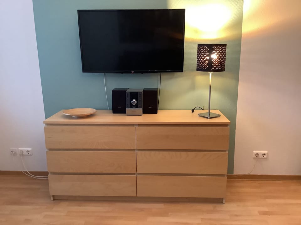 Apartment, 1 Bedroom | Living area | Flat-screen TV