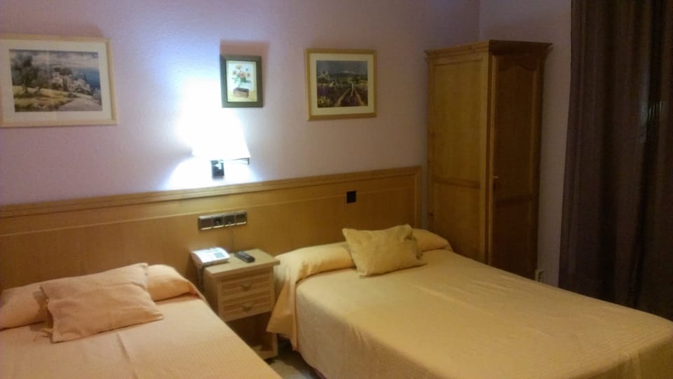 Standard Single Room, 1 Queen Bed, City View | Minibar, desk, iron/ironing board, free WiFi