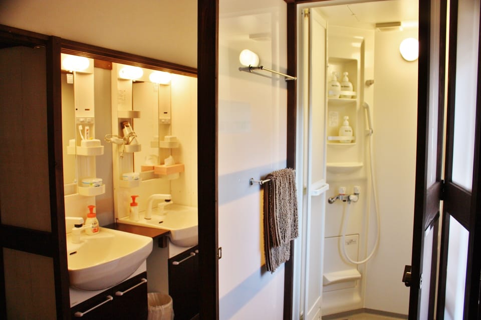 Shower, free toiletries, hair dryer, slippers