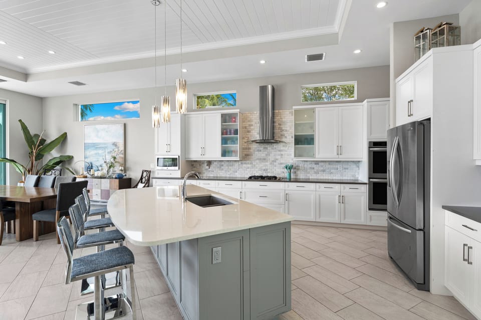 Living Room, Kitchen, Dining Room opens to Water View, Screened Lanai- 2nd Level