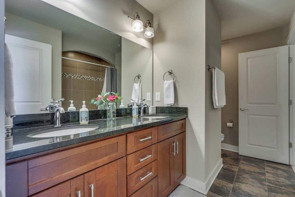 Plenty of bathrooms and vanities for your large group to all get ready together!