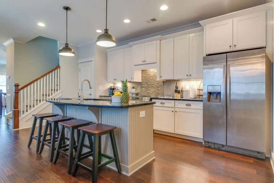 Bar stools add the perfect perch for easy dining, conversation, or a cozy start to the day.