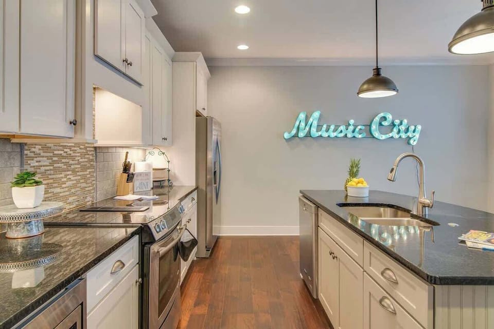 This kitchen boasts sleek stainless steel appliances, ready to elevate your culinary experience.