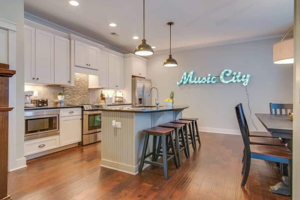 Cook, gather, and dine together in this open, connected kitchen and dining area.
