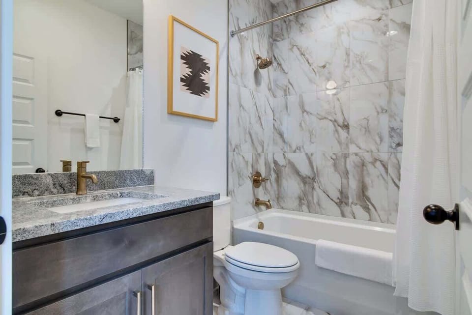 Discover the irresistible charm of flawless marble, lending sophistication and style to your stay.
