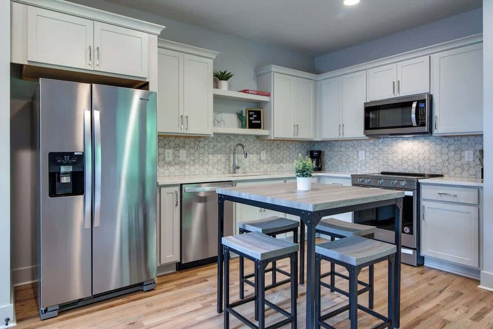 Modern appliances add a beautiful and efficient touch to our open plan kitchen.