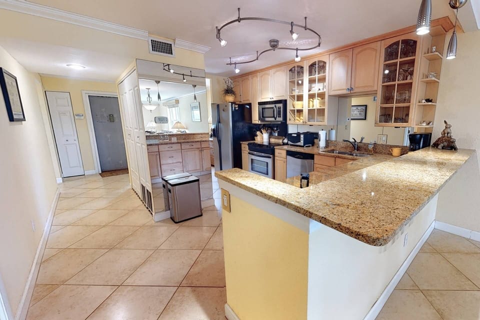 Large updated kitchen with stainless appliances and everything you need to create home-made meals.