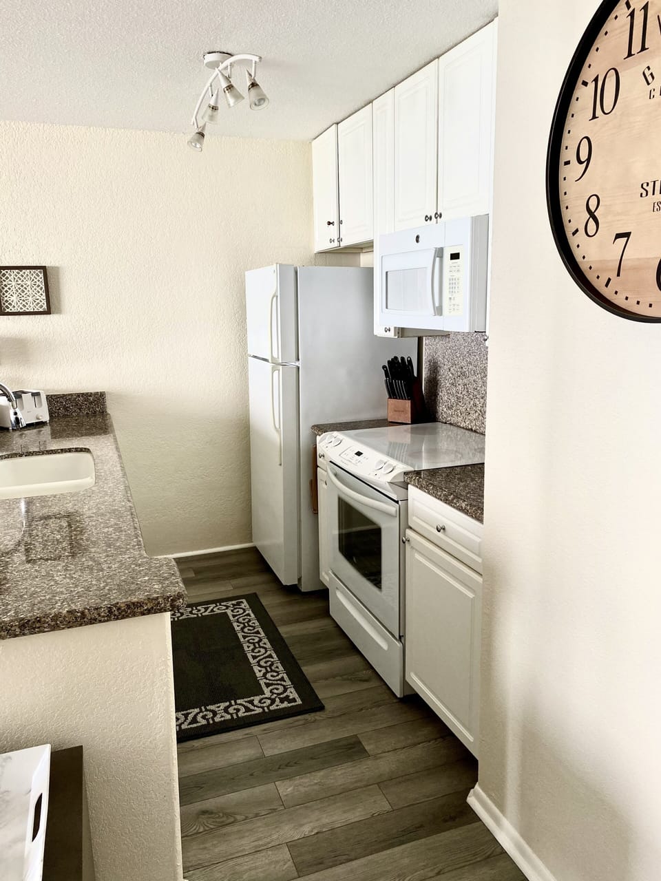 Fully stocked galley kitchen. 
