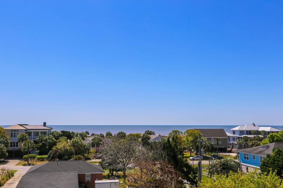 The house is conveniently located one block from the beach!