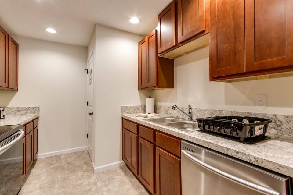 Double Stainless Steel Sinks  (laundry is behind the far door)