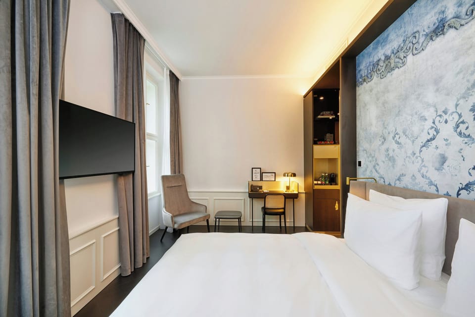 Hypo-allergenic bedding available, minibar (free items), in-room safe