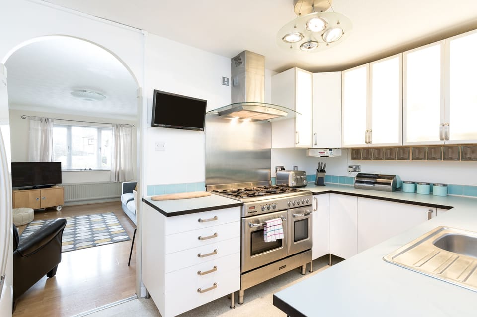 Kitchen with view into the front reception room