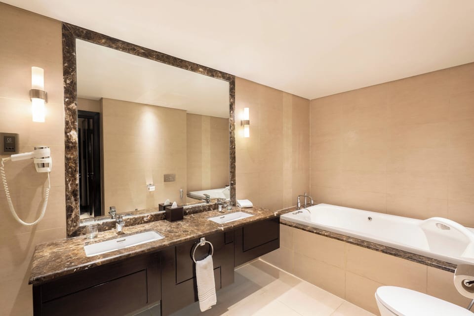 Royal Suite, 1 Bedroom, Smoking | Bathroom | Jetted tub, rainfall showerhead, designer toiletries, hair dryer