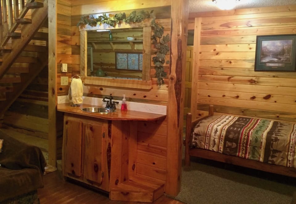 Main floor, stairs to loft on left, twin bed