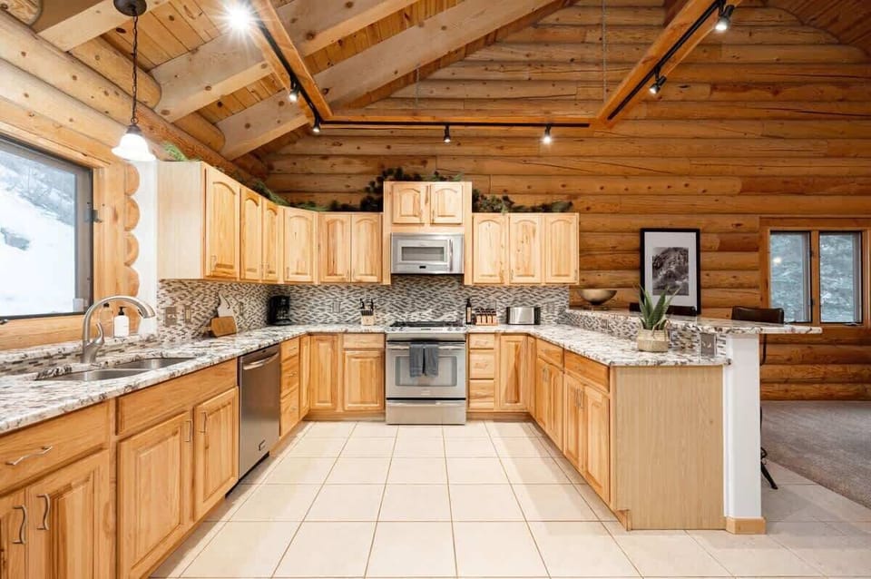 Kitchen with all stainless steel appliances