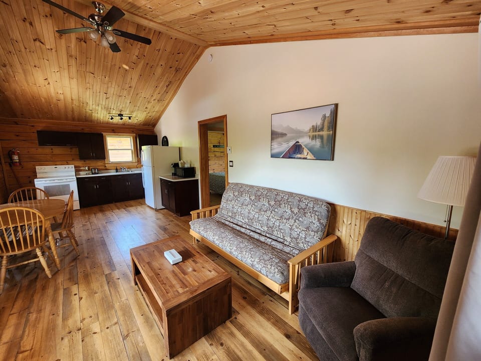 Cottage, 2 Bedrooms | Living area | 32-inch TV with satellite channels
