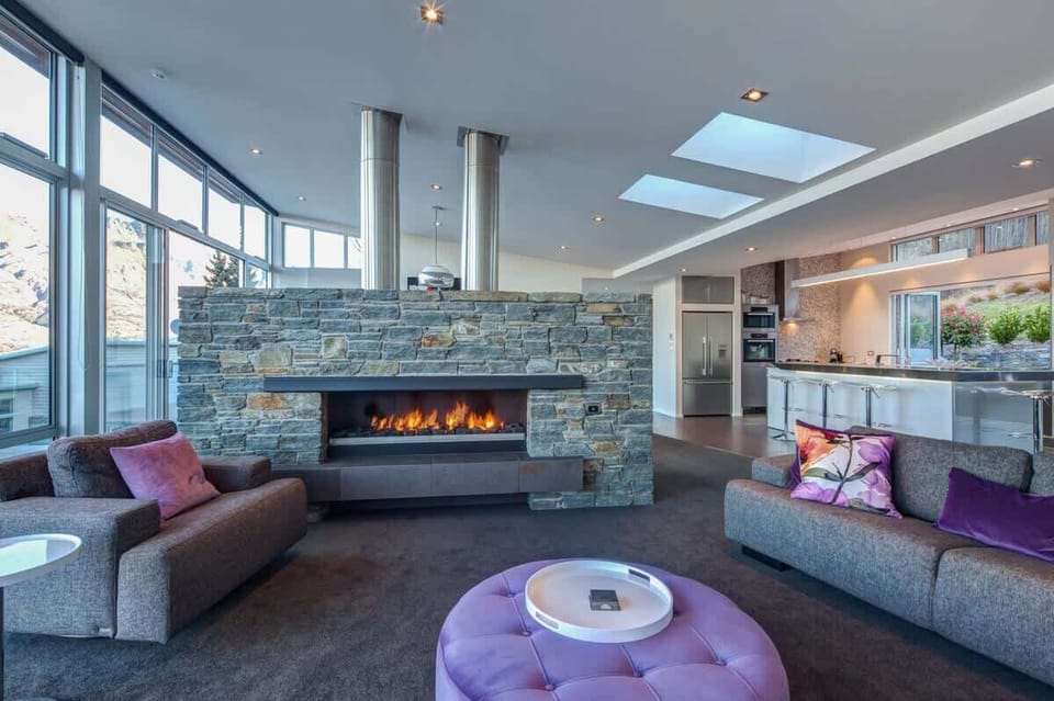 Enjoy the beautiful large fireplace on those chilly evenings at our luxury escape, New Zealand