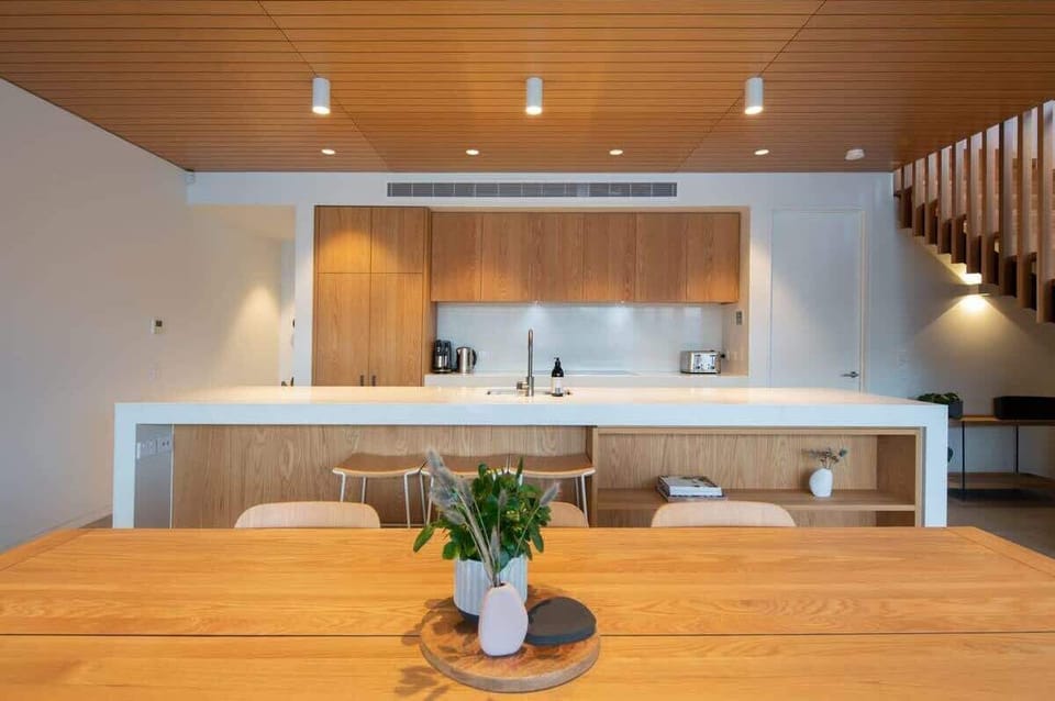 Sleek Kitchen with Coffee Corner – This well-appointed kitchen includes a Nespresso machine, ideal for starting your day with a coffee fix while surrounded by high-end finishes and stunning views.