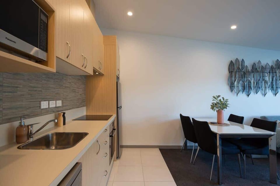 Sleek and Functional Kitchen – Enjoy cooking in this stylish kitchen, complete with a Nespresso machine, perfect for your morning coffee while taking in the beautiful surroundings.