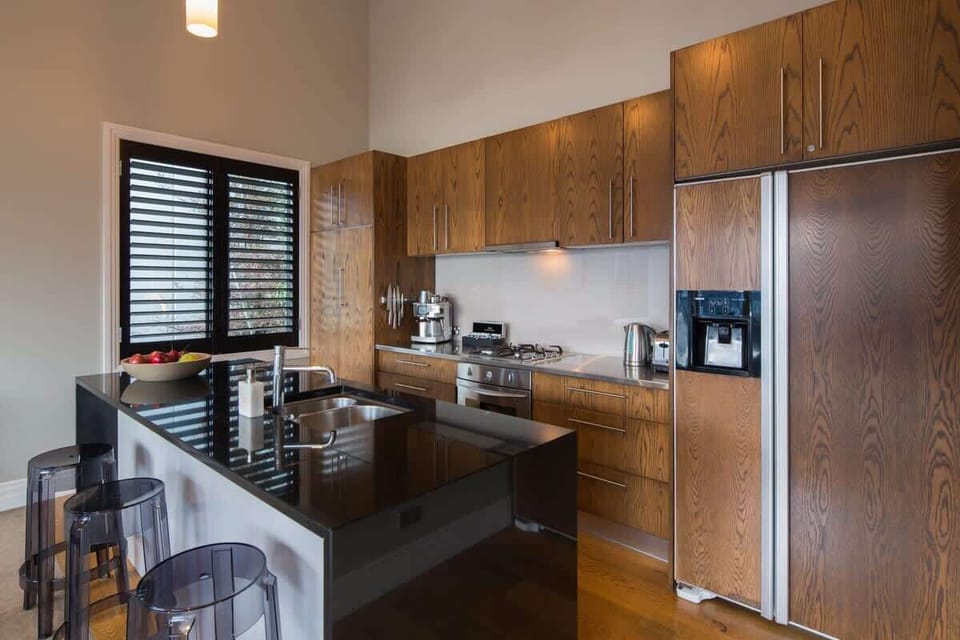 Cook and Entertain with Ease: Enjoy a spacious, open-plan design with breathtaking views, perfect for preparing meals or sharing drinks with friends.