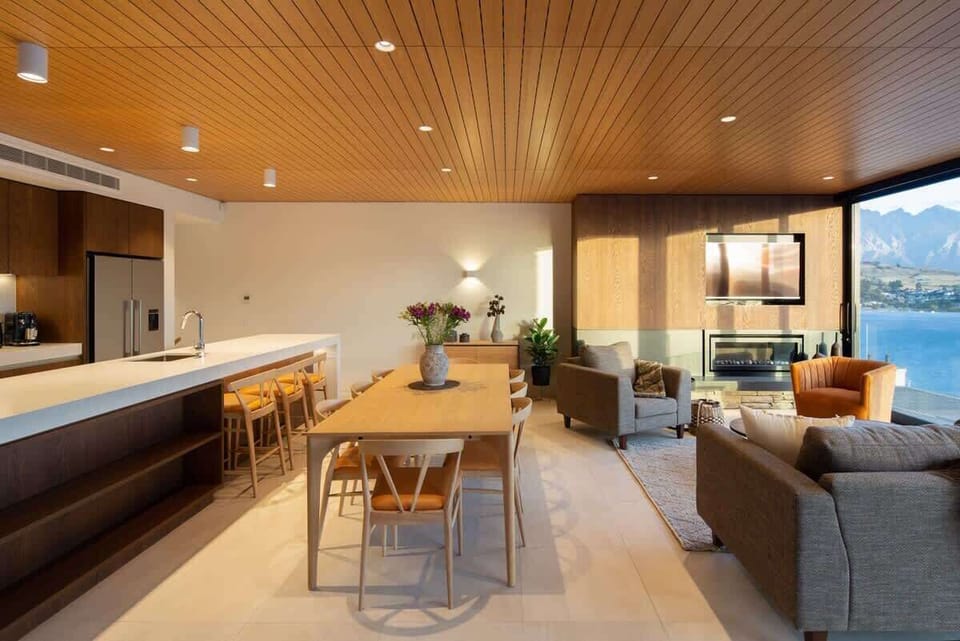 Seamless integration of living, dining, and kitchen in this luxury lodge, Queenstown