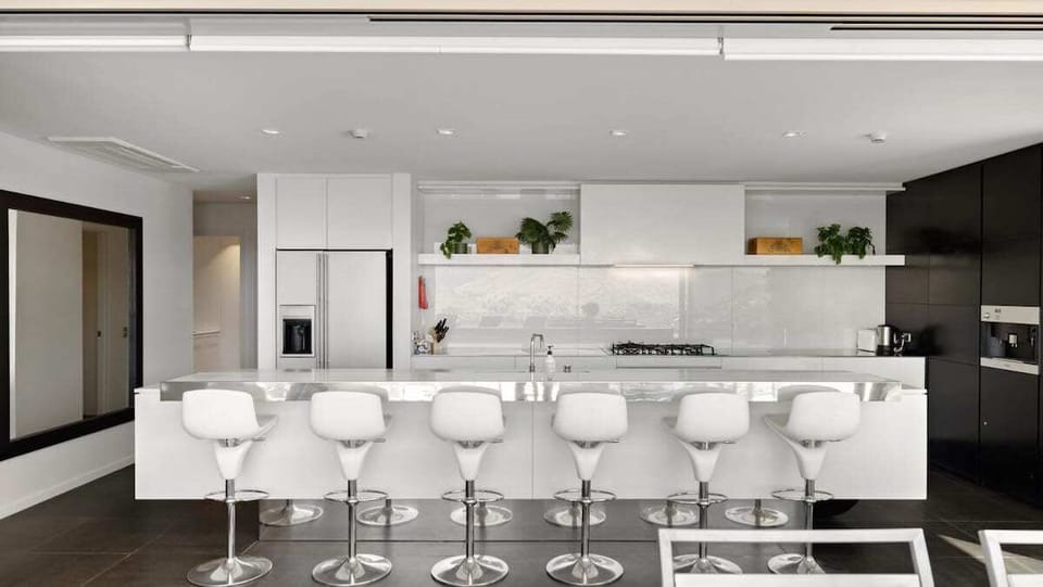 Gourmet Kitchen
Cook like a chef in the state-of-the-art kitchen, featuring top-tier appliances, sleek cabinetry, and a spacious layout perfect for preparing meals in style.
