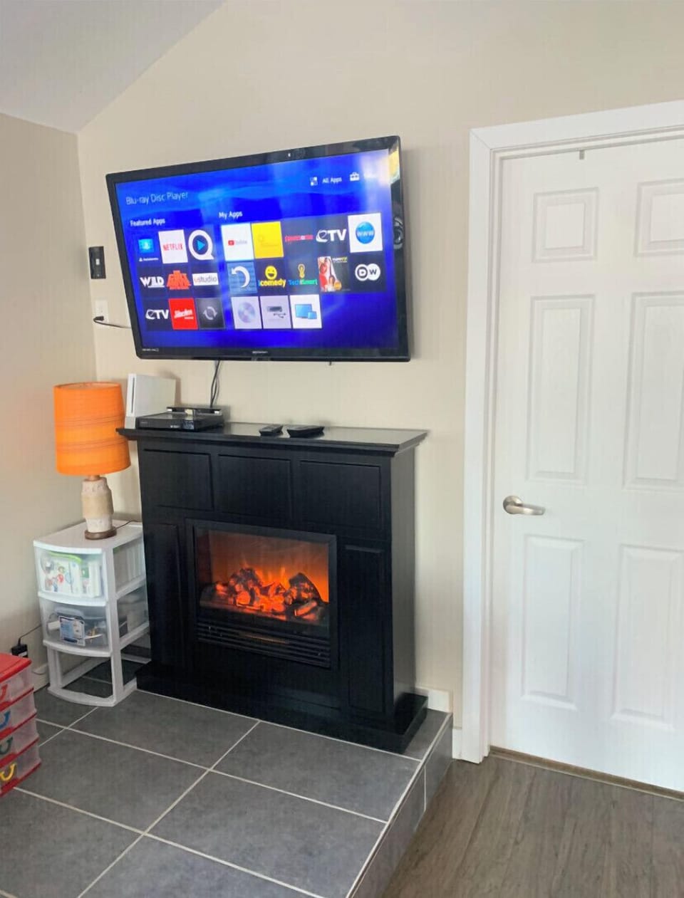 Electric fireplace for ambiance and a nice fire pit in the front yard.  