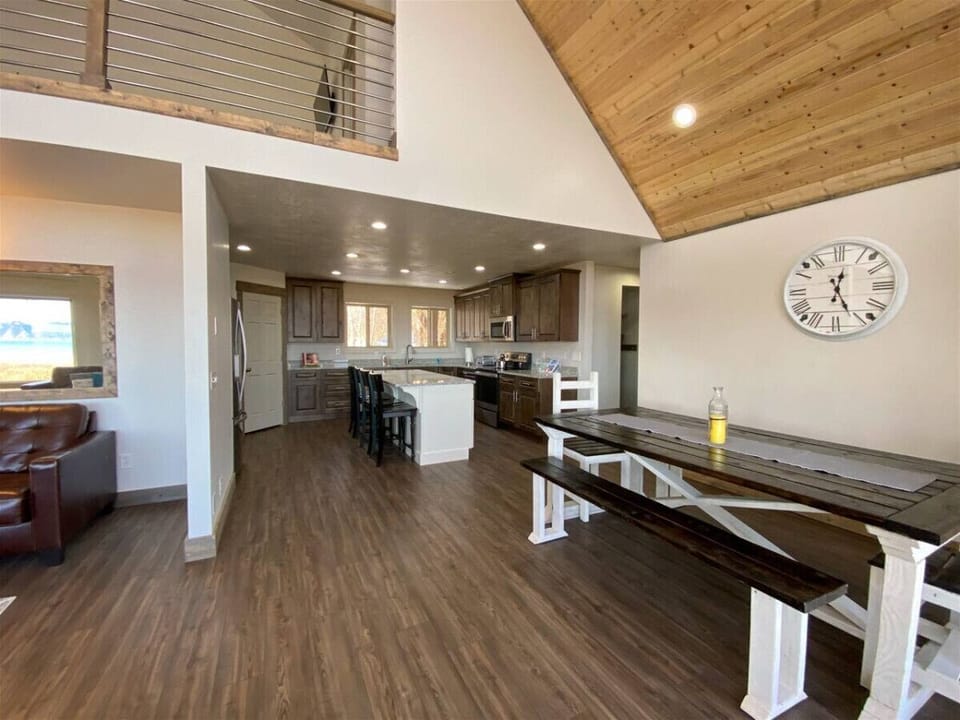 Spacious kitchen and dining area perfect for gathering, cooking, and sharing memorable meals together.