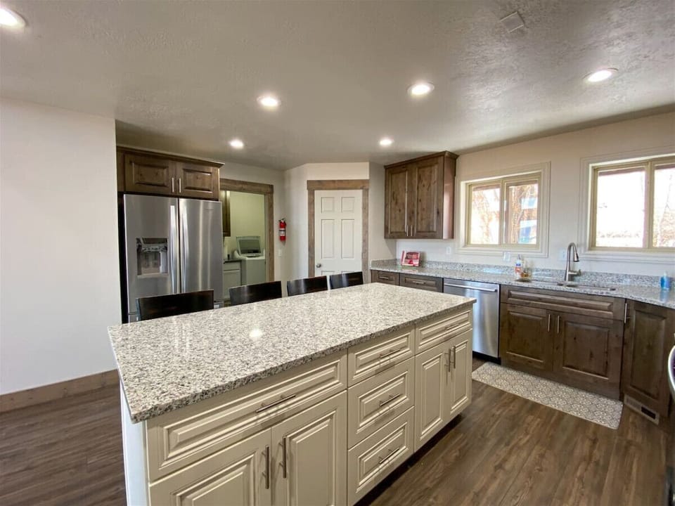 Spacious, modern kitchen with granite countertops—perfect for cooking, gathering, and creating lasting memories.