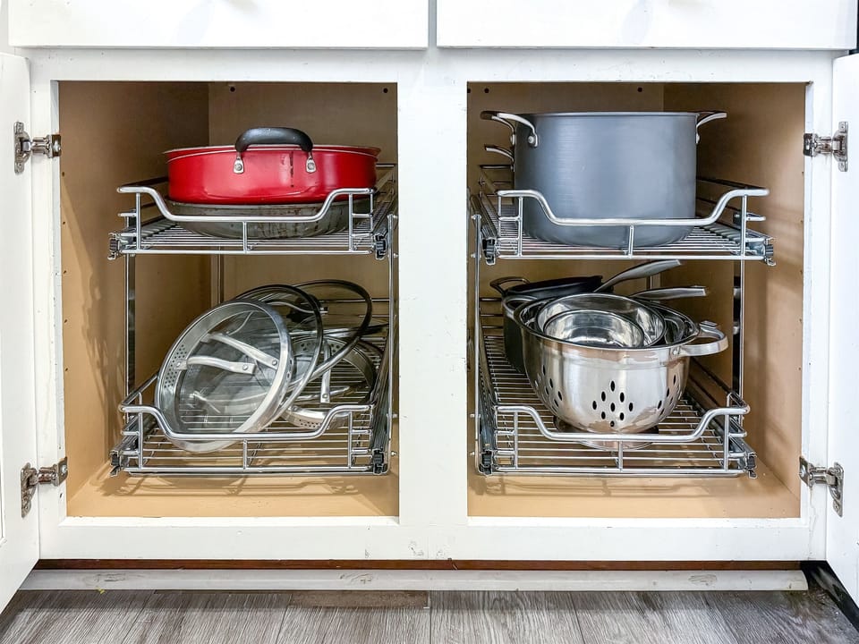 One of several cabinets with the things needed to prepare large meals efficiently.
