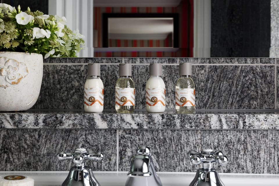 Rainfall showerhead, designer toiletries, hair dryer, bathrobes
