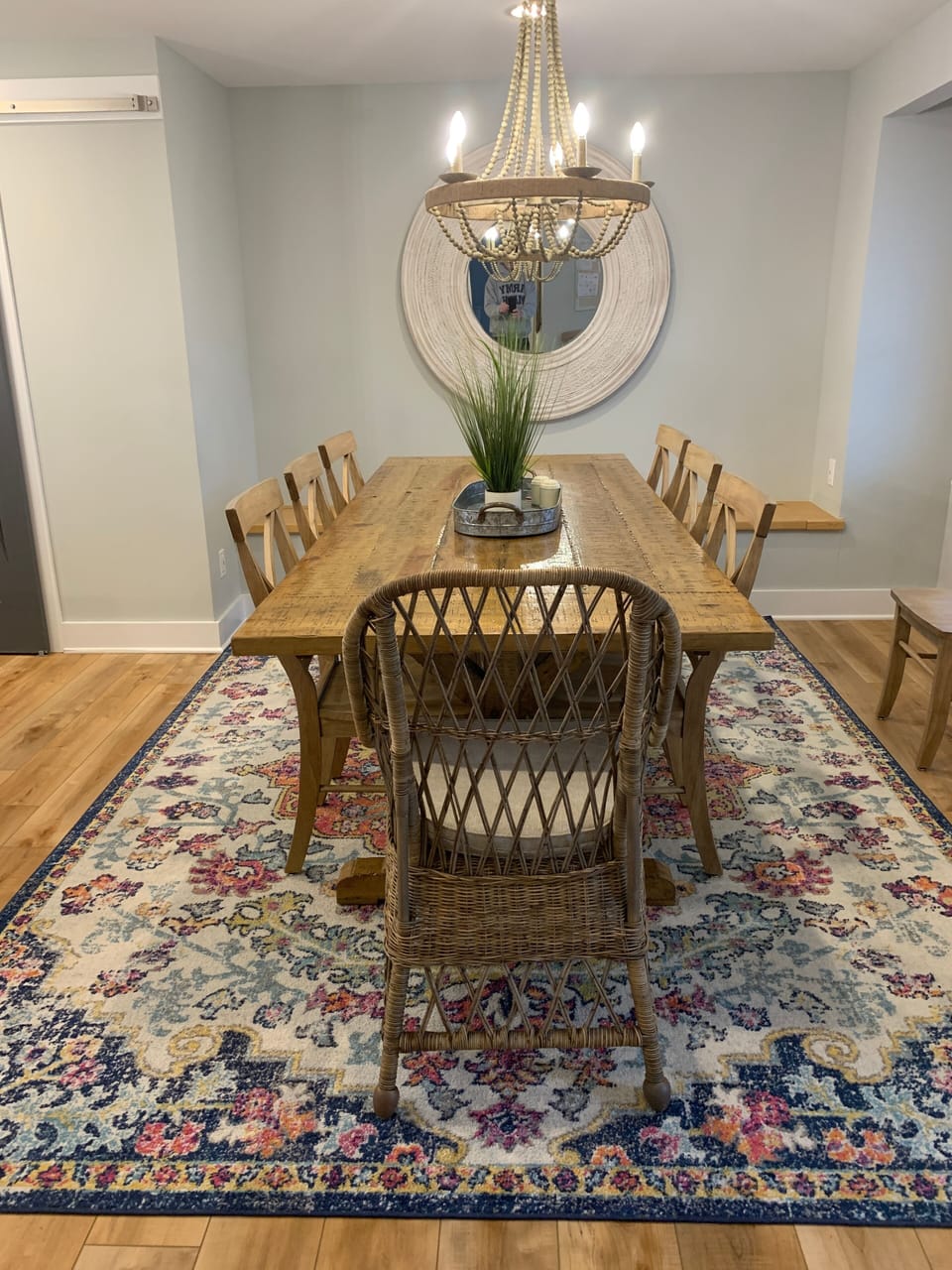 Dining table with 8 settings and extra chairs to seat 10
