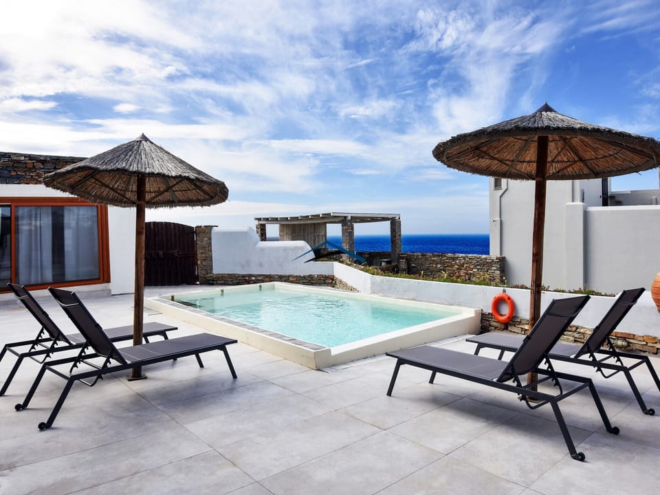 The pool area and the guest house