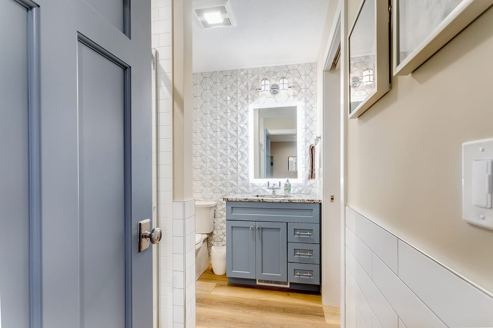 Upstairs, mini-master bathroom with shower.