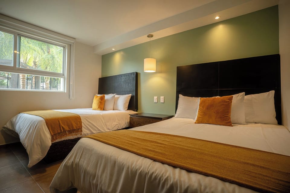 Family Double Room, 2 Bedrooms | Minibar, desk, laptop workspace, blackout drapes