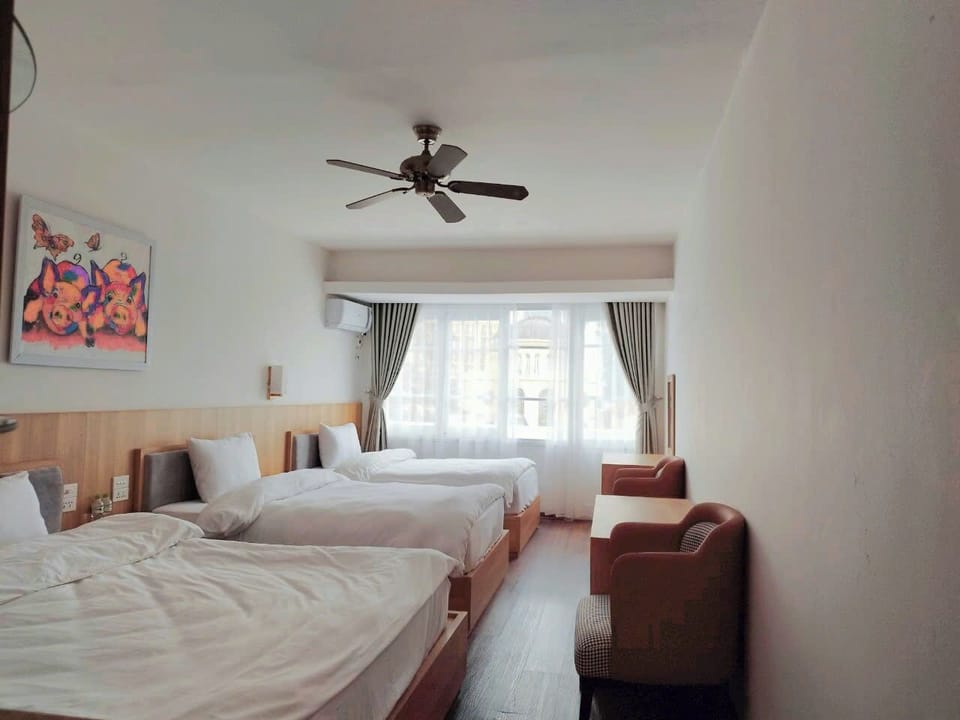 Family Room | Minibar, desk, laptop workspace, free WiFi